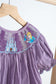 Purple castle hand smocked gingham dress